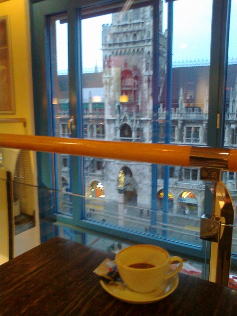 The Munich Rathaus, as seen from the roof café at Hugendubel, coffee pot in the foreground