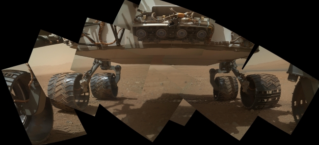 Panorama of Curiosity's Belly Check,  This view of the lower front and underbelly areas of NASA's Mars rover Curiosity combines nine images taken by the rover's Mars Hand Lens Imager (MAHLI) dur...