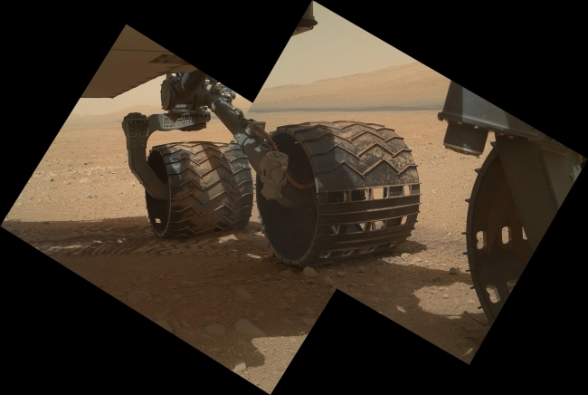 Wheels and a Destination,  This view of the three left wheels of NASA's Mars rover Curiosity combines two images that were taken by the rover's Mars Hand Lens Imager (MAHLI) during th...