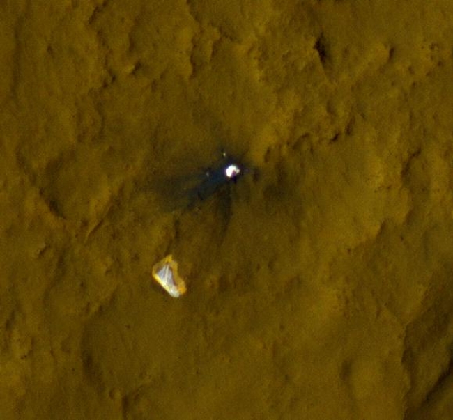 Relics of Rover's Landing,  This color view of the parachute and back shell that helped deliver NASA's Curiosity rover to the surface of the Red Planet was taken by the High-Resolution...