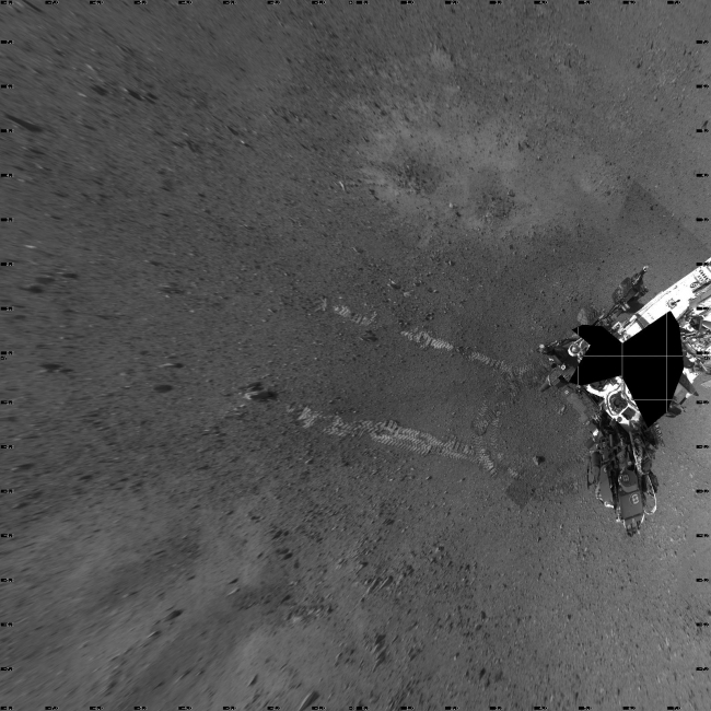 Rover Takes Its First 'Steps',  This overhead view shows evidence of a successful first test drive for NASA's Curiosity rover. On Aug. 22, 2012, the rover made its first move, going forwar...