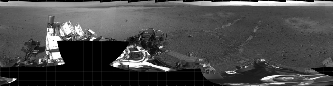 Curiosity's First Track Marks on Mars, This 360-degree panorama shows evidence of a successful first test drive for NASA's Curiosity rover. On Aug. 22, 2012, the rover made its first move, going f...