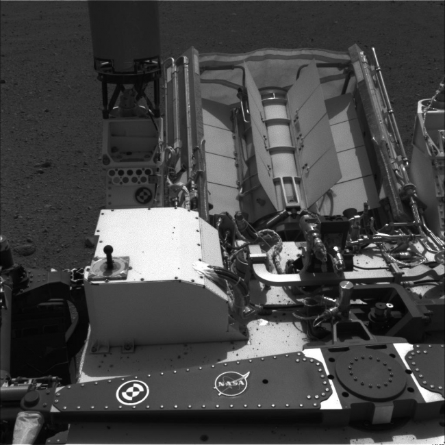 Readying ChemCam, Annotated Version Click on the image for larger version This image shows the calibration target for the Chemistry and Camera (ChemCam) instrument on NASA's C...