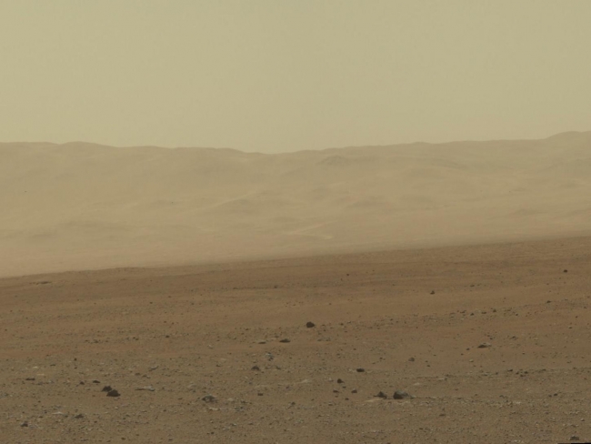 Wall of Gale Crater, Figure 1 Click on the image for larger view This color image from NASA's Curiosity rover shows part of the wall of Gale Crater, the location on Mars where th...