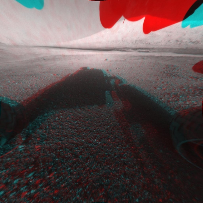 3-D View from the Front of Curiosity,  This image is a 3-D view in front of NASA's Curiosity rover, which landed on Mars on Aug. 5 PDT (Aug. 6 EDT). The anaglyph was made from a stereo pair of Ha...