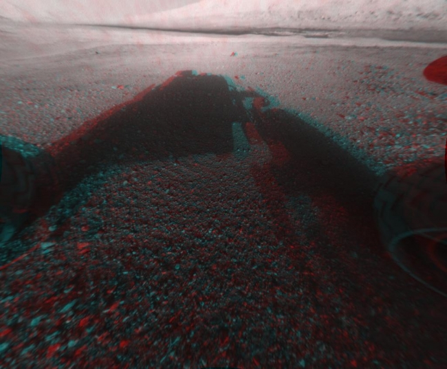 3-D View from the Front of Curiosity,  This image is a 3-D view in front of NASA's Curiosity rover, which landed on Mars on Aug. 5 PDT (Aug. 6 EDT). The anaglyph was made from a stereo pair of Ha...