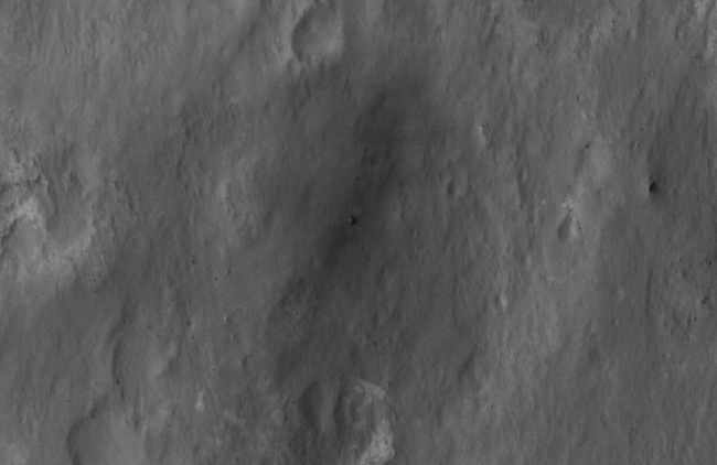 Curiosity Spotted!,  This close-up view shows NASA's Curiosity rover on the surface of Mars. The image was captured by the High-Resolution Imaging Science Experiment (HiRISE) ca...