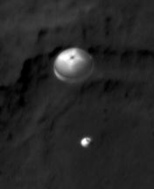 Curiosity Spotted on Parachute by Orbiter,  NASA's Curiosity rover and its parachute were spotted by NASA's Mars Reconnaissance Orbiter as Curiosity descended to the surface on Aug. 5 PDT (Aug. 6 EDT)...