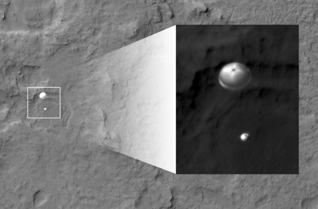 Curiosity Spotted on Parachute by Orbiter,  NASA's Curiosity rover and its parachute were spotted by NASA's Mars Reconnaissance Orbiter as Curiosity descended to the surface on Aug. 5 PDT (Aug. 6 EDT)...