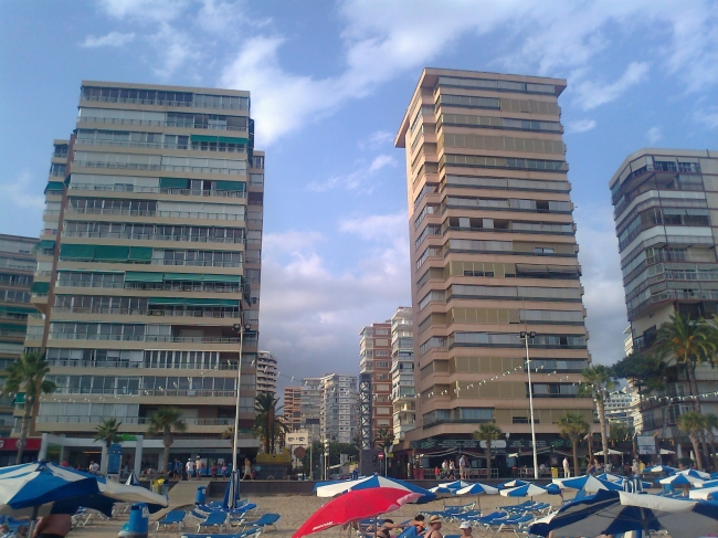 Principado Manila on center-right, Levante beach