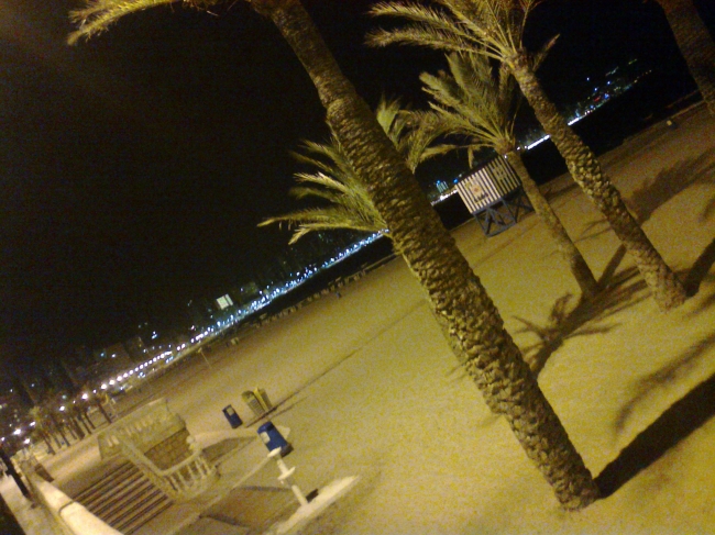 Poniente Beach promenade at night, on the very end, where there are still reains of the old, more baroque promenade