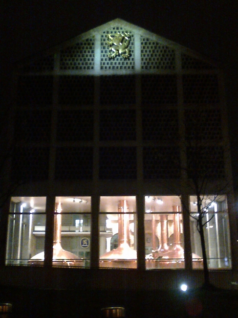 Brass pots of the Löwenbräu brewery, at night