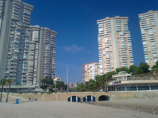 Beach at Balcon de Poniente, looking to buildings and river exit